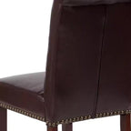 Silla de comedor Parson tapizada con respaldo enrollado, ribete de tachuelas y estructura con acabado y deslizadores de plástico para el suelo